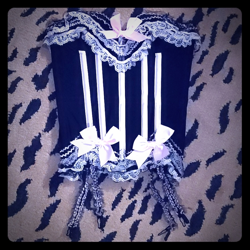 Black and pink ruffle bow corset